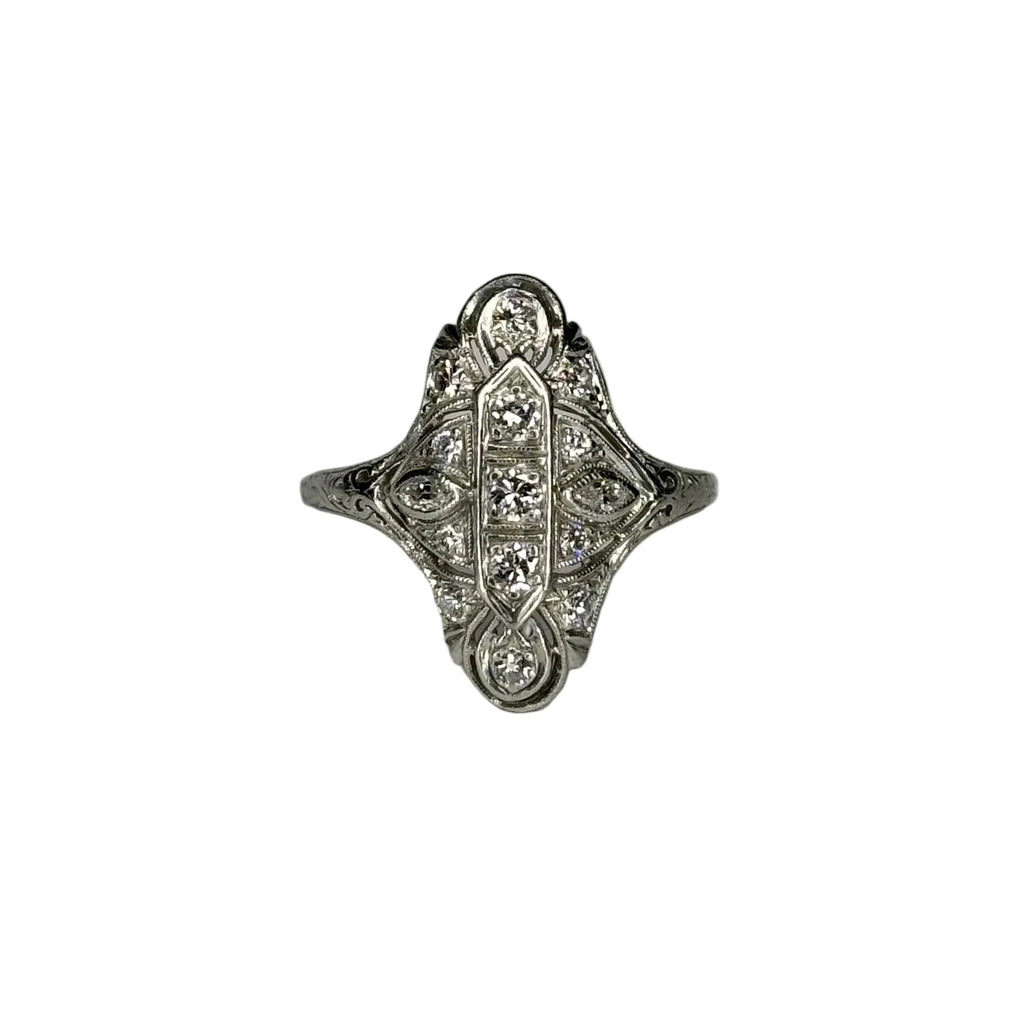 Decorative ring with intricate design on a white background