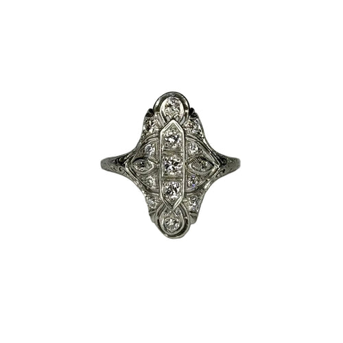 Decorative ring with intricate design on a white background