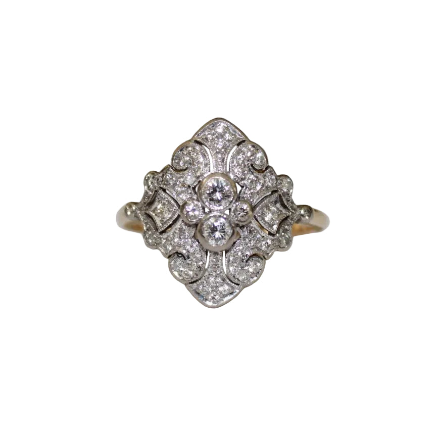 Diamond ring with intricate design on a white background