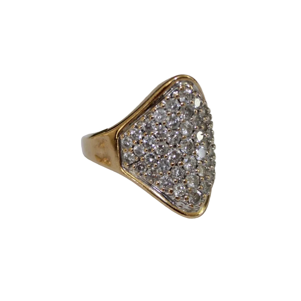 Gold ring with diamond pavé on a white background