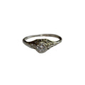 White Gold ring with a diamond on a white background
