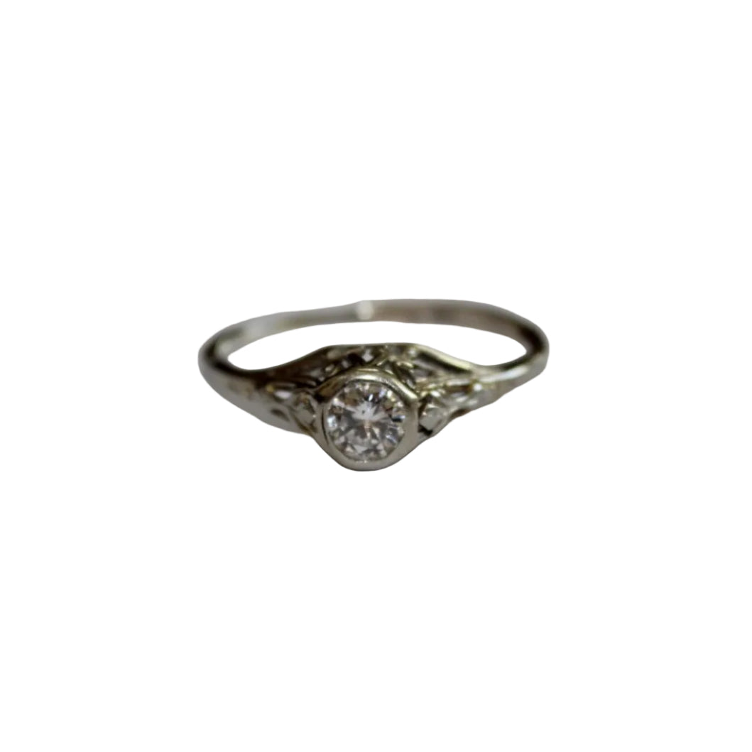White Gold ring with a diamond on a white background