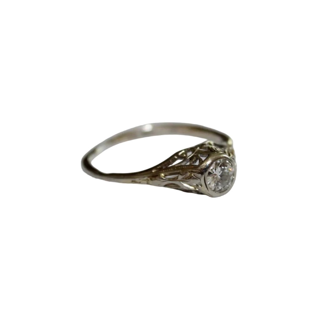 White Gold ring with a diamond on a white background
