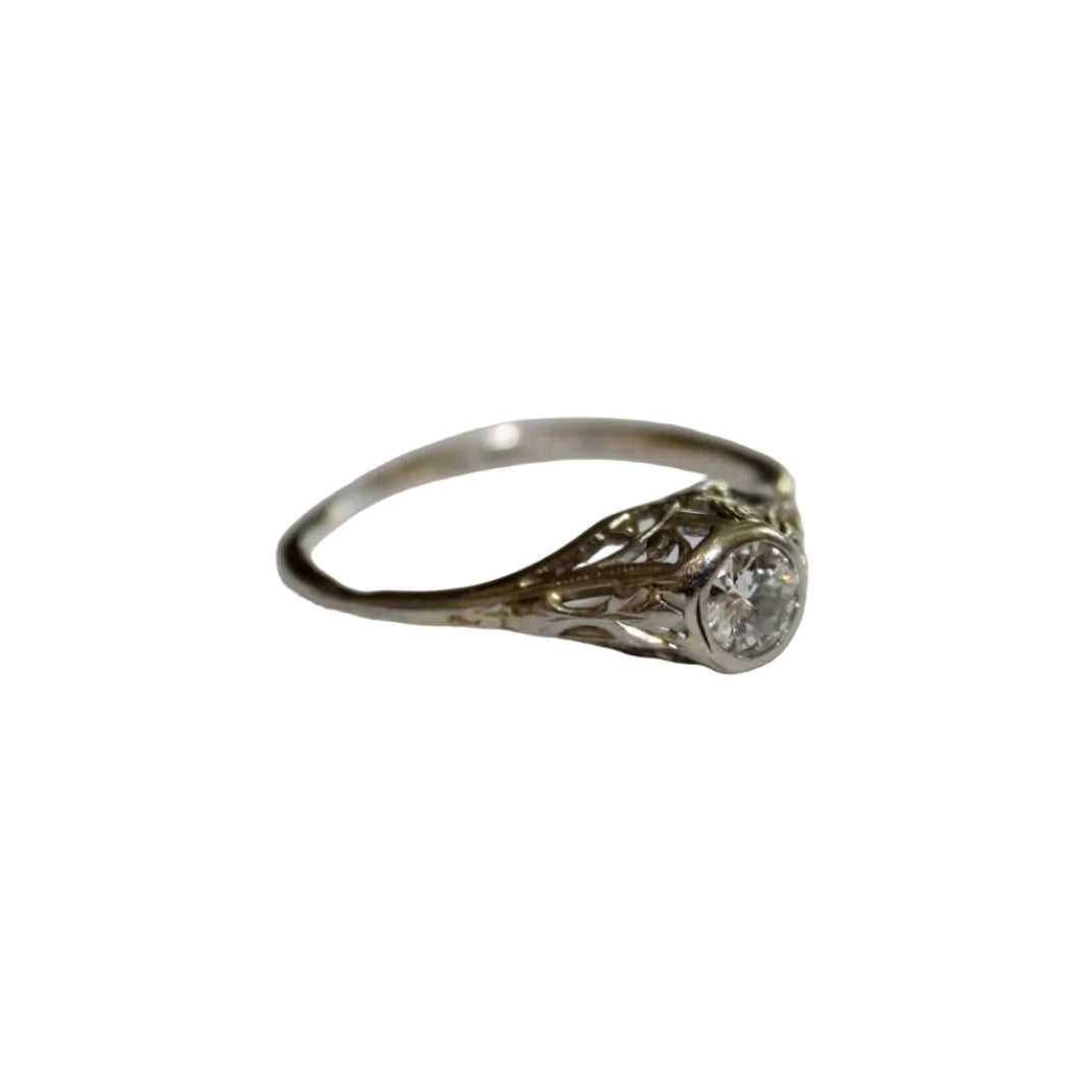 White Gold ring with a diamond on a white background