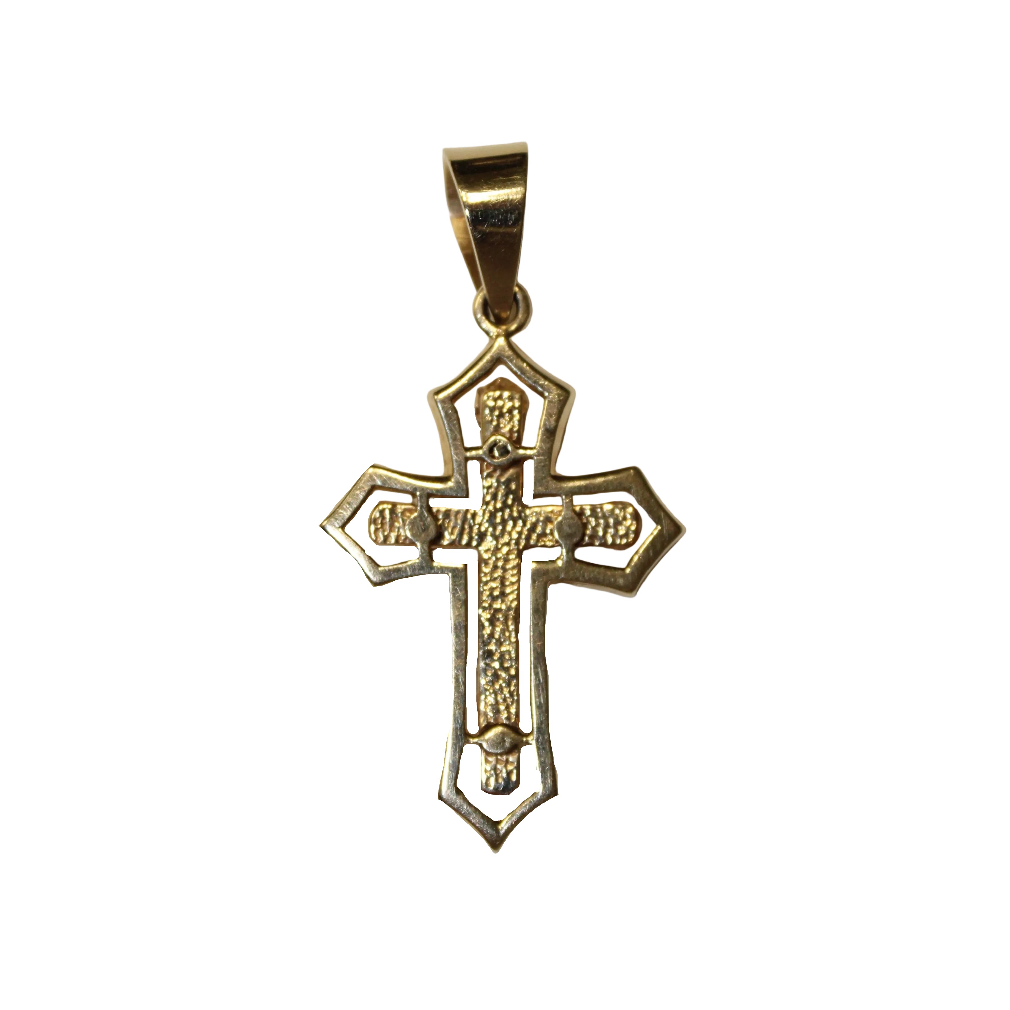 Gold cross pendant on a light beige background